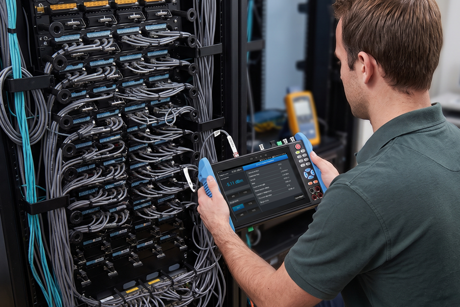 CCTV technician performing mixed-system maintenance and fault isolation